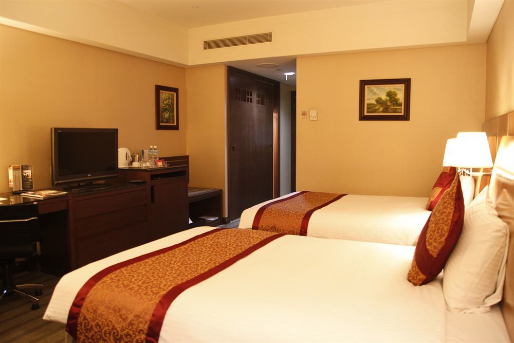 Evergreen Plaza Hotel - Tainan Exterior photo Deluxe Room